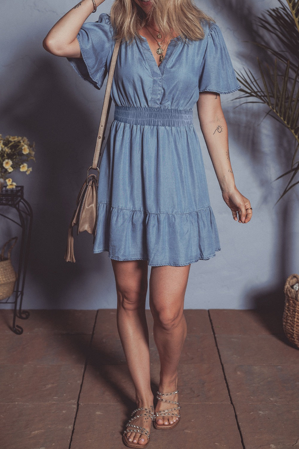 Ruffled Hem Smocked Flutter Sleeve Denim Mini Dress