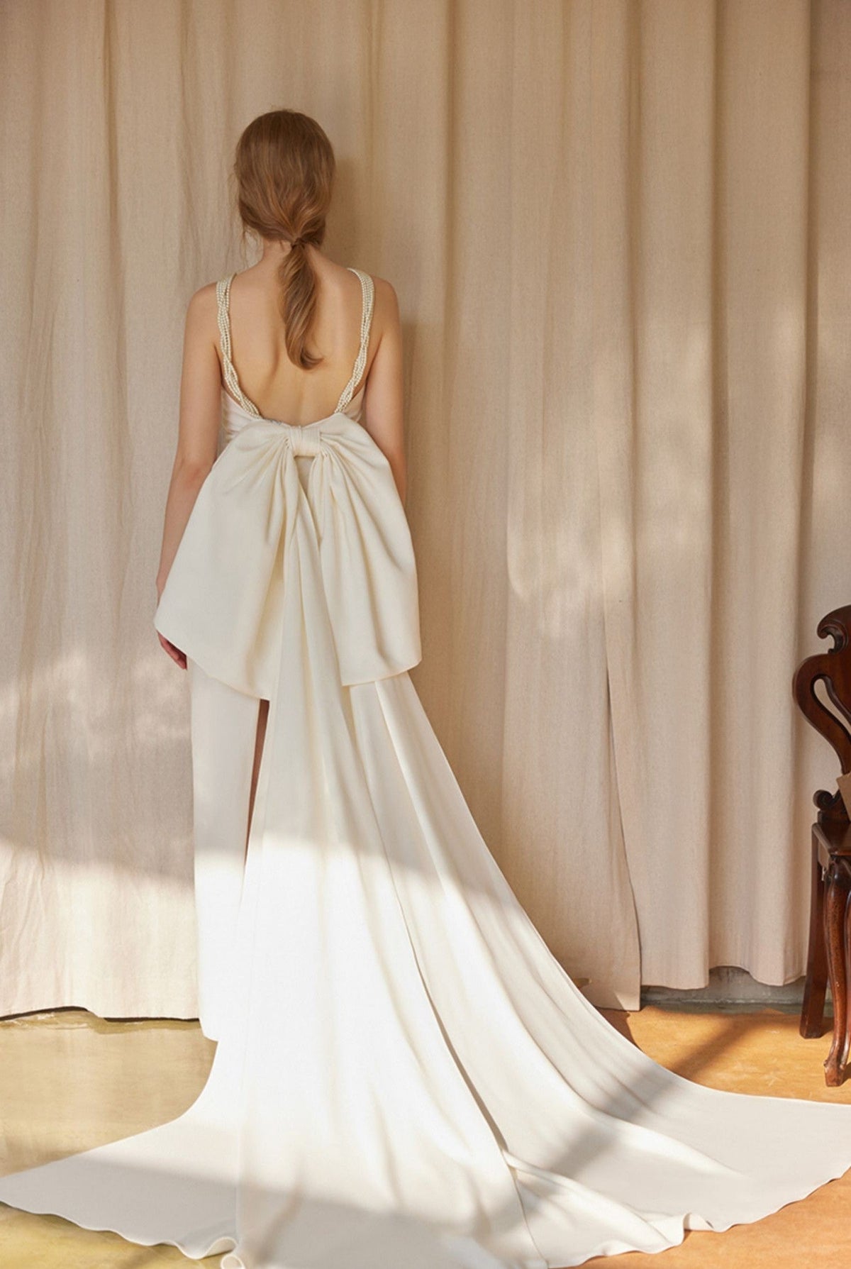 Pearl Strap Halter Satin Wedding Dress with Dramatic Back Bow and Train