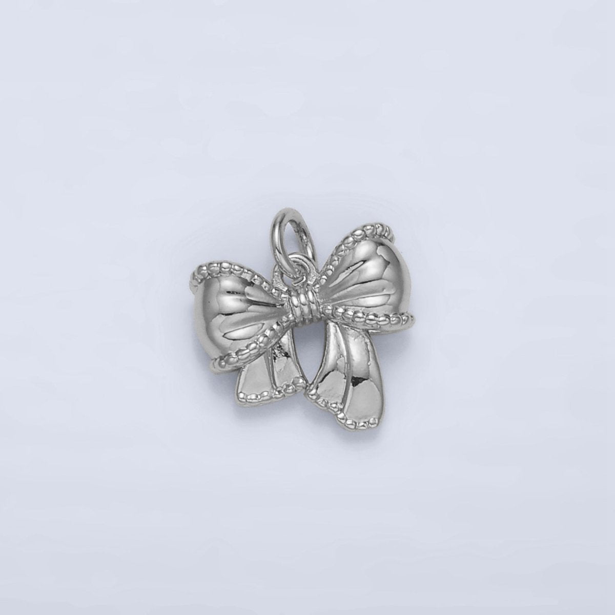 24K Gold Filled 10.5mm Textured Ribbon Bow Charm in Gold & Silver | AC144