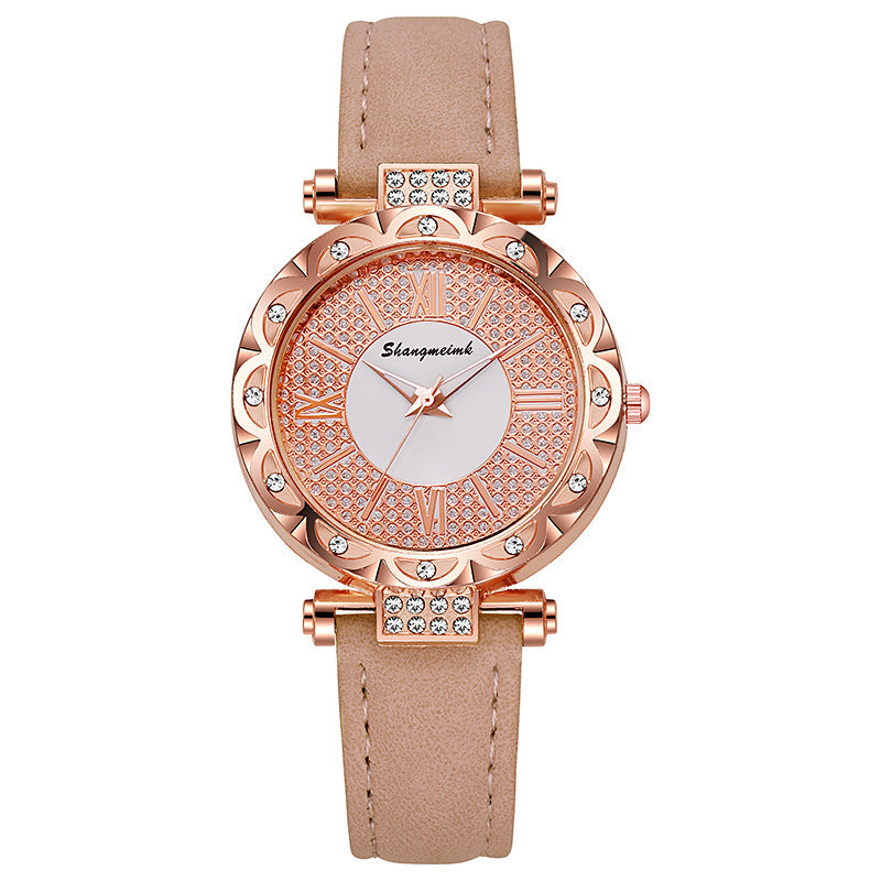 Korean-style quartz watch with a simple leather strap.
