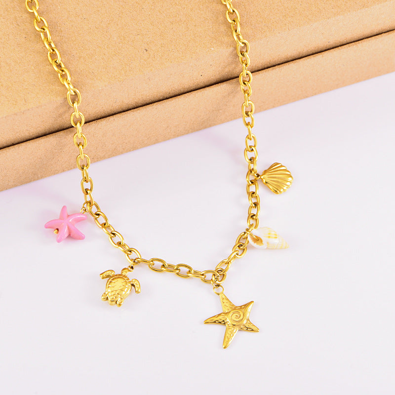 starfish turtle conch gold necklace