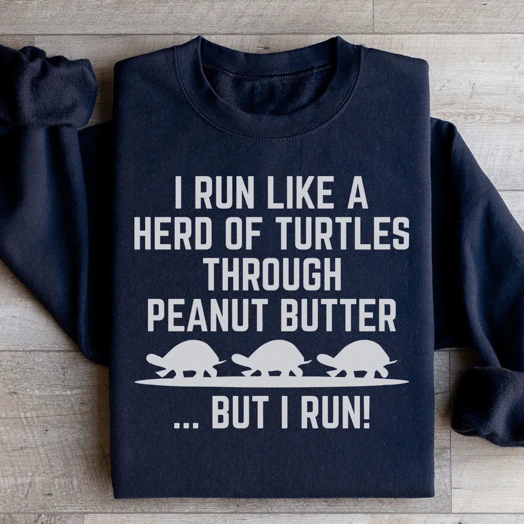 "I Run Like A Herd Of Turtles Through Peanut Butter But I Run!" – Funny Fitness Graphic Pullover