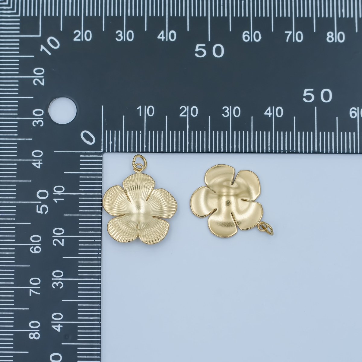 Stainless Steel Ringed Lined Flower Charm | P791