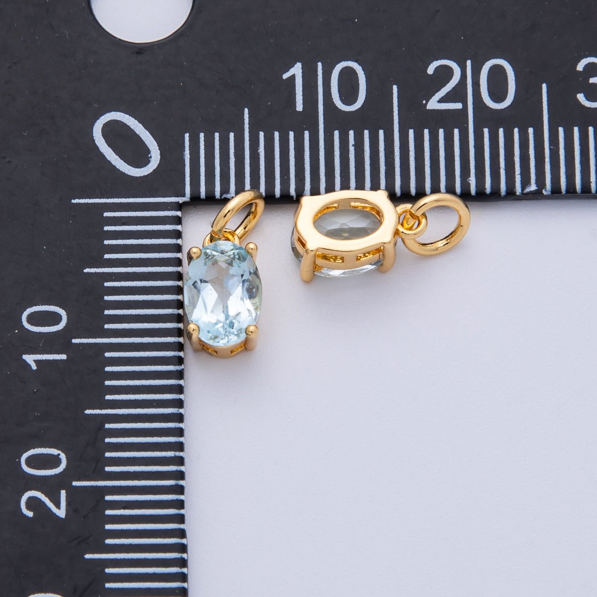 18K Gold Filled 8.8mm Light Blue CZ Oval Birthstone Charm | Charms-00330