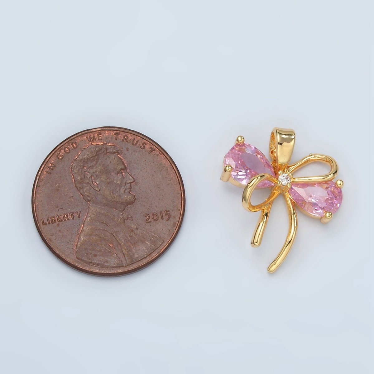 24K Gold Filled Clear, Pink CZ Bow Ribbon Pendant | H859