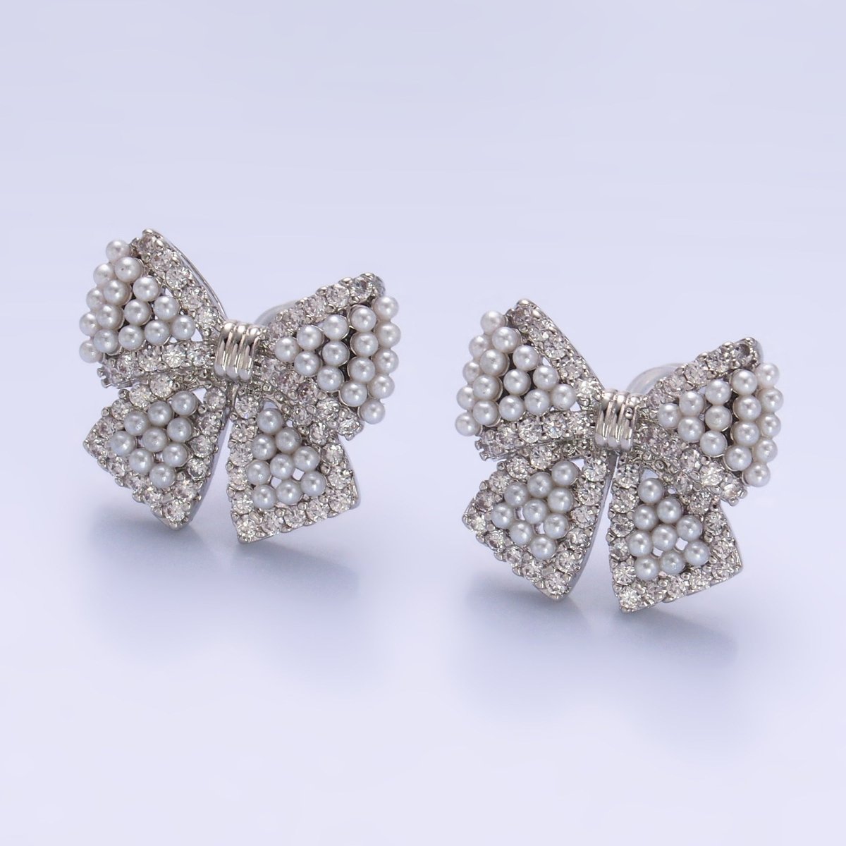 24K Gold Filled Shell Pearl Dotted Micro Paved CZ Ribbon Bow Stud Earrings in Gold &amp; Silver | AB692 AB693