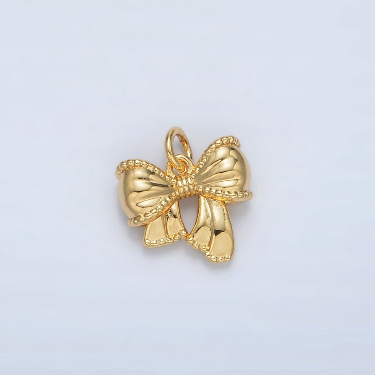 24K Gold Filled 10.5mm Textured Ribbon Bow Charm in Gold &amp; Silver | AC144