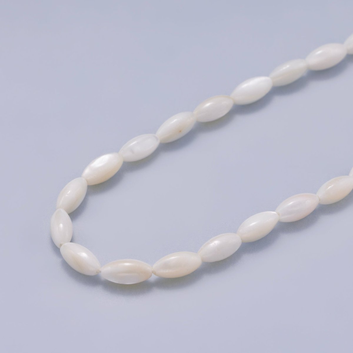 4.5mm White Button Trochid Freshwater Pearl Strand Finding | WA-04421