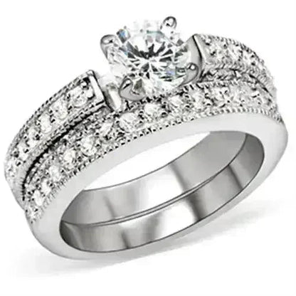 5X016 Rhodium Brass Ring – 6.5mm AAA Clear CZ Solitaire (Bold &amp; Brilliant)
