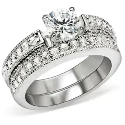 5X016 Rhodium Brass Ring – 6.5mm AAA Clear CZ Solitaire (Bold &amp; Brilliant)