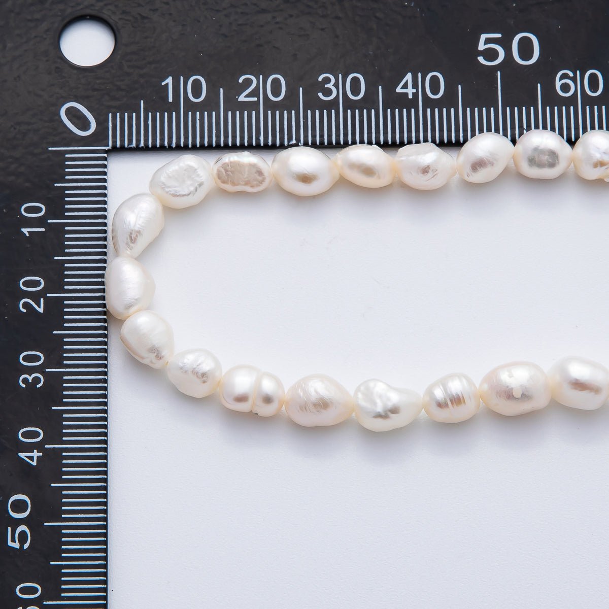 7.3mm Natural White Freshwater Pearl Rice-Shaped Beads Strands | WA-3503