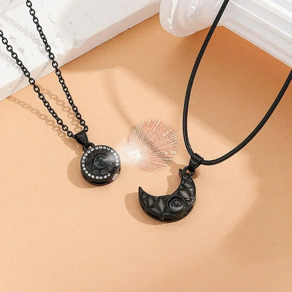 2Pcs Glowing Moon and Sun Projection Couple Necklaces in 100 languages expressing "I love you" - fashionable gift jewelry