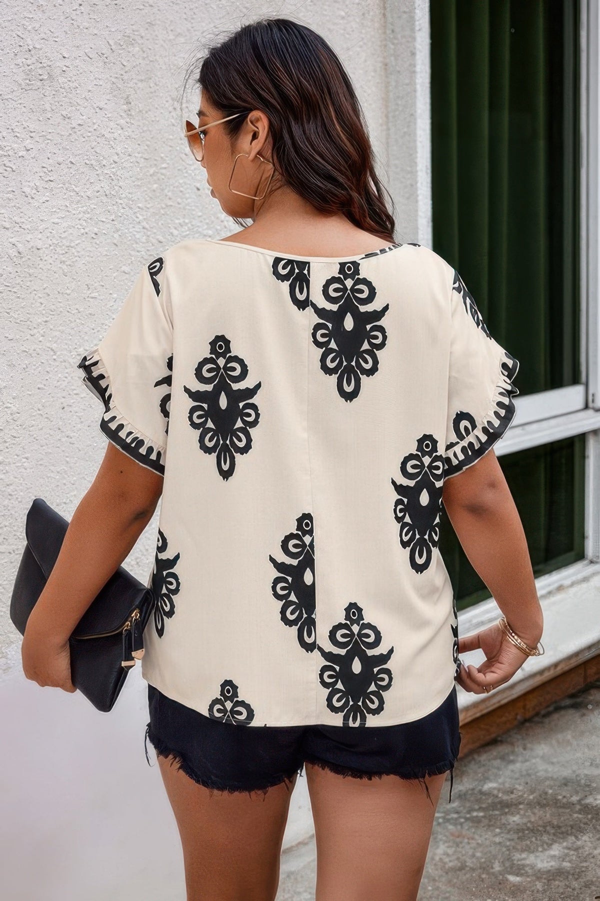 Plus Printed Ruffle Hem Wide Round Neck Blouse