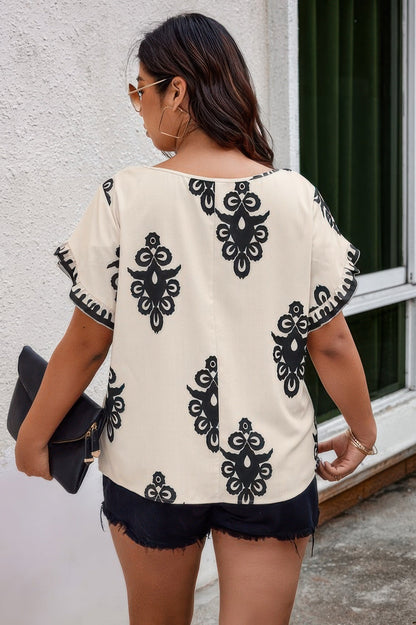 Plus Printed Ruffle Hem Wide Round Neck Blouse