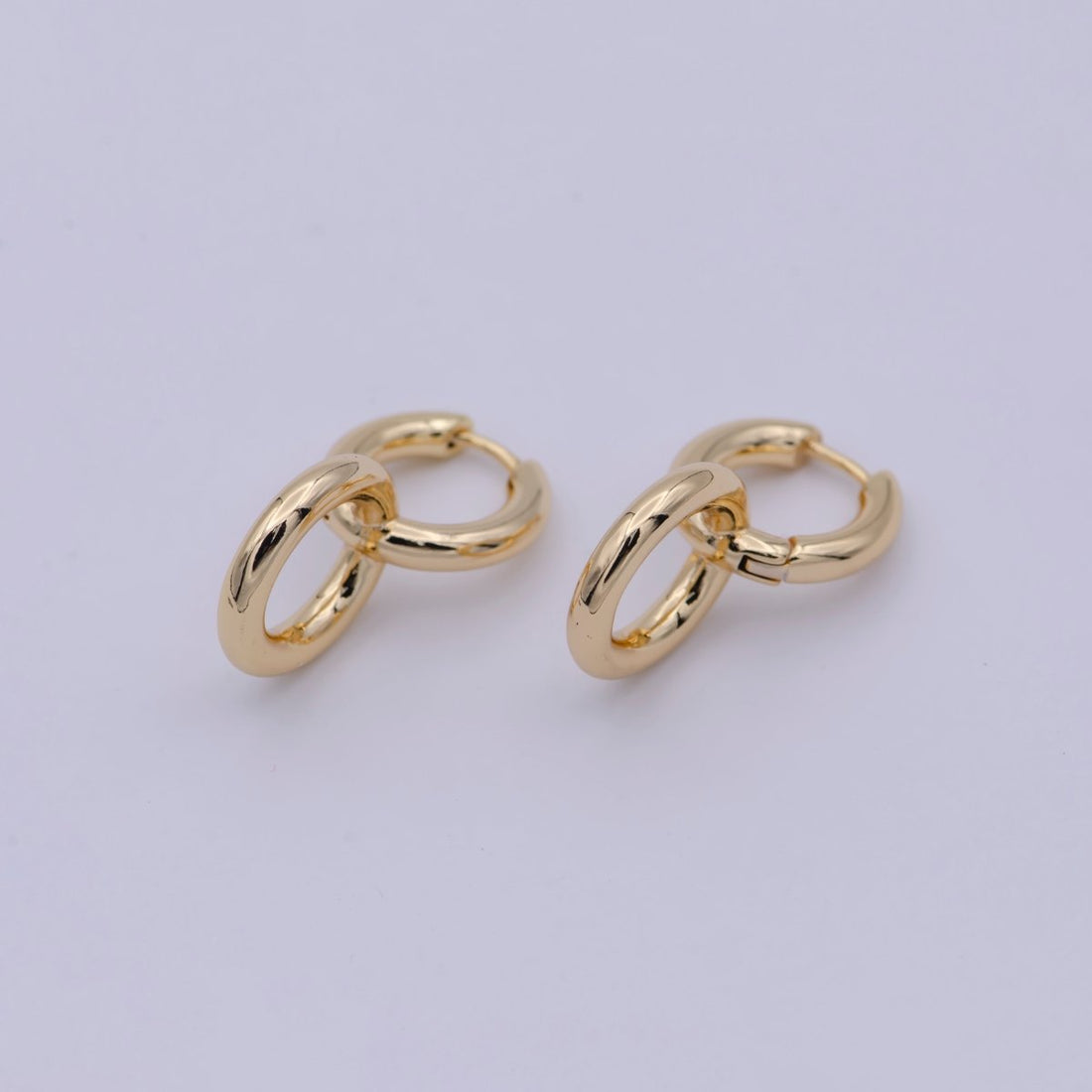 Dainty Intertwined Huggie Earrings with Round Dangle Charm Drop | AD-085
