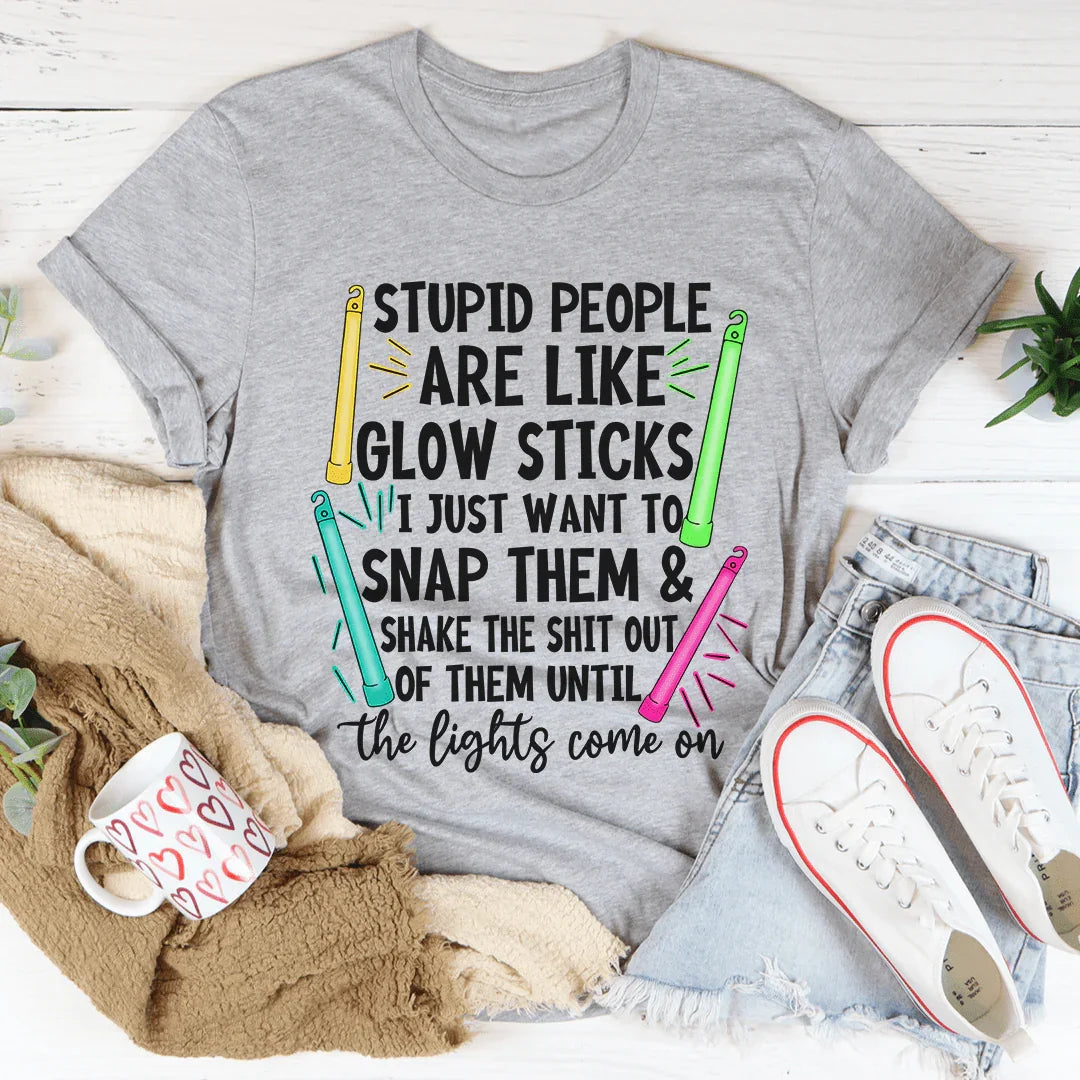Sarcastic Neon Humor Graphic Shirt – \"STUPID PEOPLE ARE LIKE GLOW STICKS\"