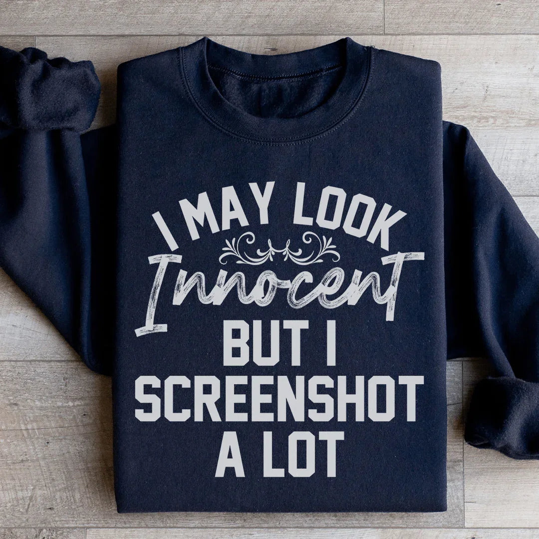 I May Look Innocent But I Screenshot A Lot Sweatshirt