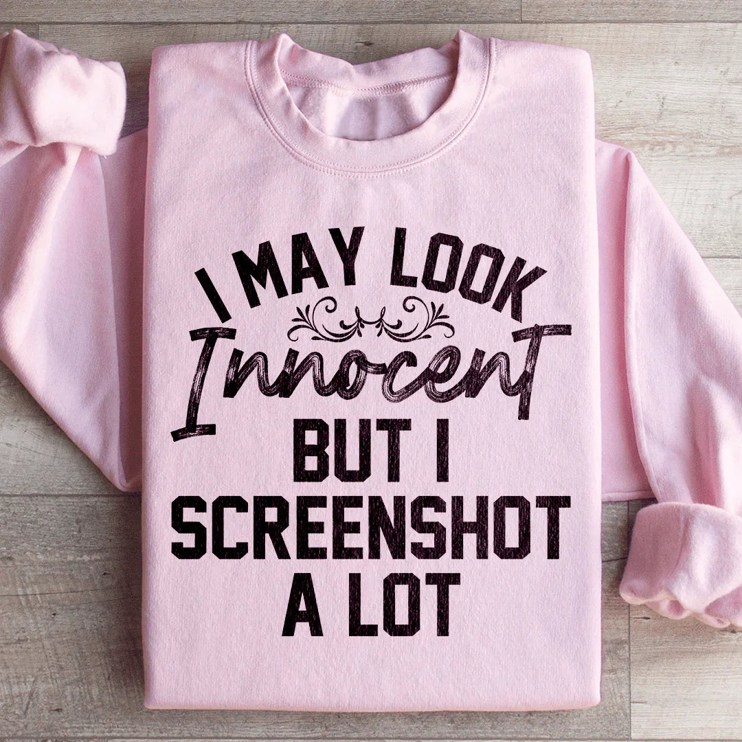 I May Look Innocent But I Screenshot A Lot Sweatshirt