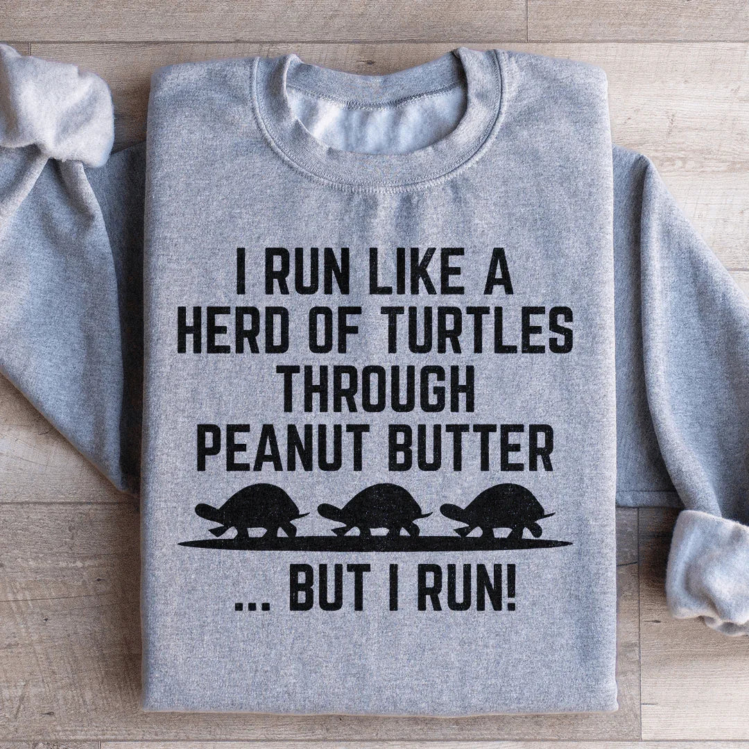 "I Run Like A Herd Of Turtles Through Peanut Butter But I Run!" – Funny Fitness Graphic Pullover