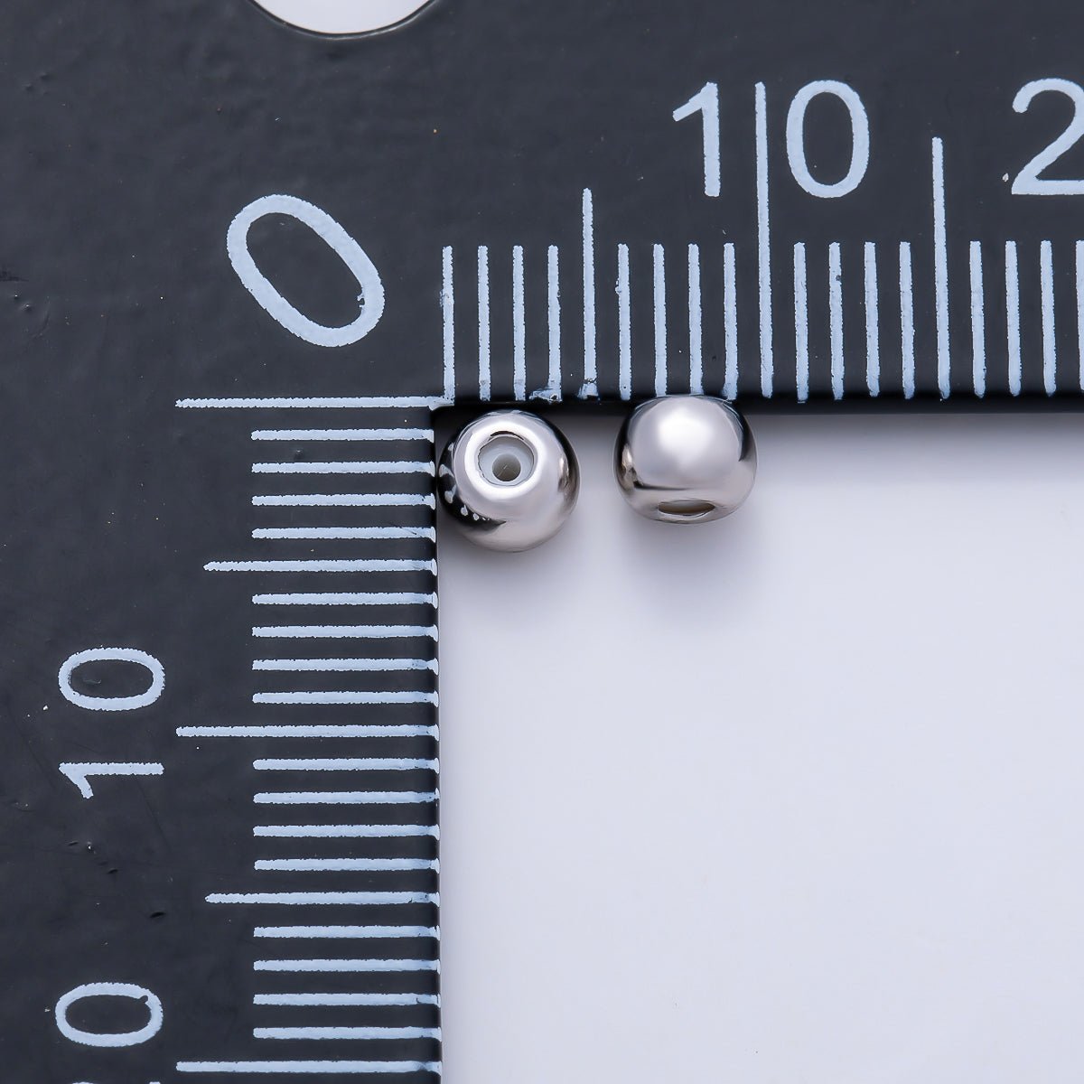 Rhodium Plated 4mm Silicone Rubber Slide Bead | Findings-00406