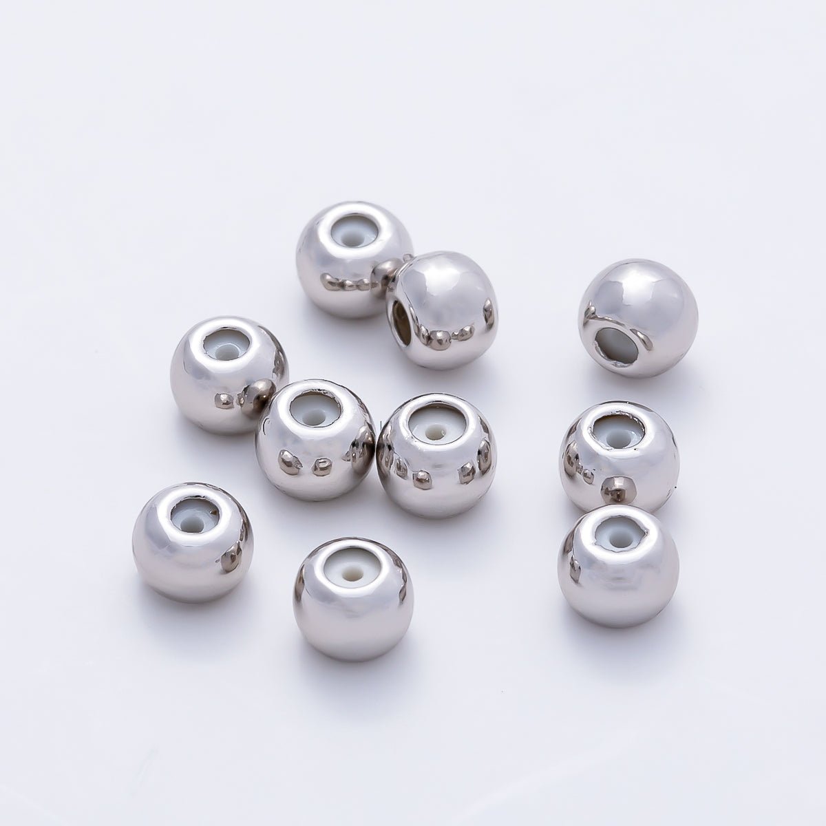 Rhodium Plated 4mm Silicone Rubber Slide Bead | Findings-00406