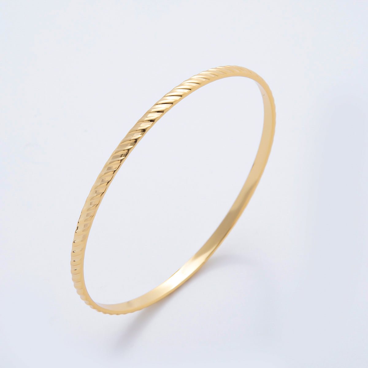 Gold Stainless Steel Diagonal Ridge Pattern Round Bangle Bracelet | WA-3464