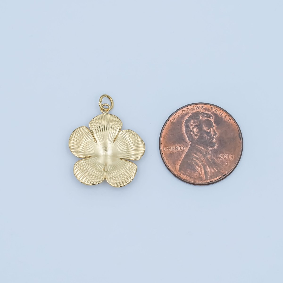 Stainless Steel Ringed Lined Flower Charm | P791