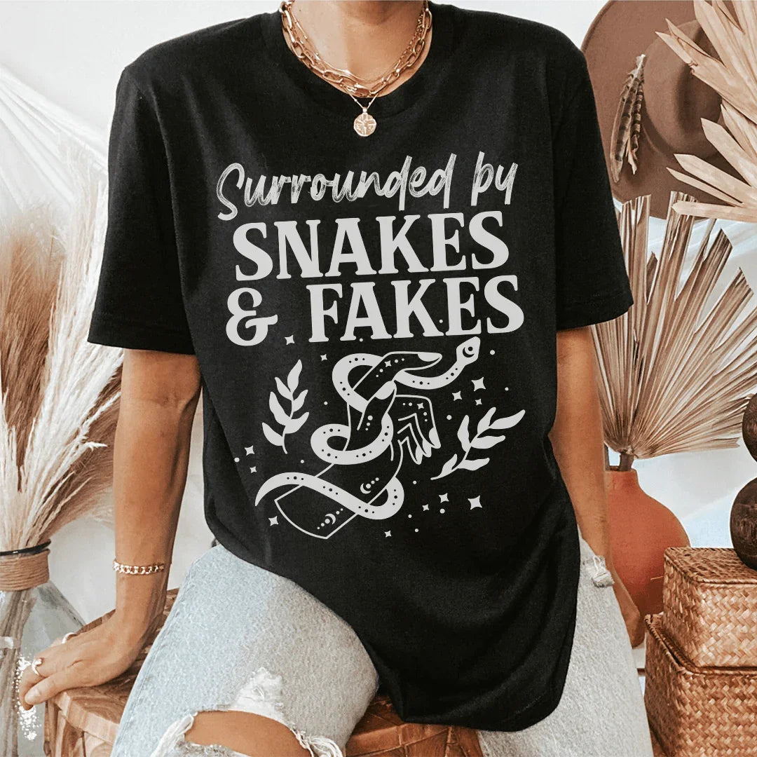 Surrounded By Snakes &amp; Fakes Tee